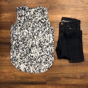 Black and grey sleeveless button up top